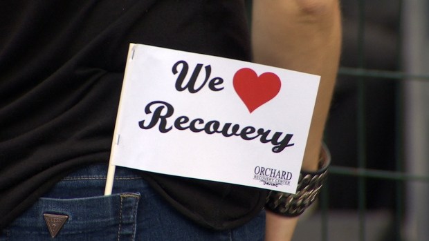 Orchard Recovery Center flags handed out to attendees of the 2016 Recovery Day.